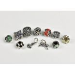 A small collection of Pandora silver charms all decorated with either enamel or CZs, including two