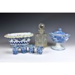 An English pearlware Chinese Raft pattern sauce tureen of oval urn form, with lion head finial to
