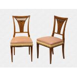 A pair of Biedermeier satin walnut and ebony inlaid side chairs first half 19th century, the