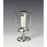 A George V silver vase Cohen & Charles, Chester 1911, of elongated stretched urn shaped form with
