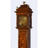 A fine late Victorian or Edwardian figured walnut and marquetry musical longcase clock in the