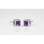 A Gucci 18ct white gold and amethyst pendant and matching stud earrings the square cut amethysts