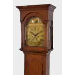 A late 18th century Channel Islands oak longcase clock by the eight day bell strike movement with