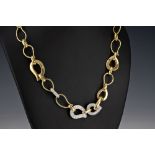 A Mappin & Webb 18ct yellow gold and diamond necklace the two colour gold fancy link necklace with