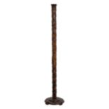 A Chinese carved hardwood standard lamp early 20th century, the sectional column with raised