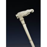 A 19th century Anglo-Indian ivory walking stick the shaft, simulating bamboo, each section