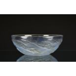 A Rene Lalique Chiens bowl opalescent blue clear and frosted glass, moulded 'R. LALIQUE' and