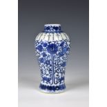 A small Chinese porcelain blue and white baluster vase with four character Kangxi mark to base (
