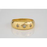 An Edwardian 18ct gold and diamond three stone gypsy set ring hallmarked Birm. 1886, size T.