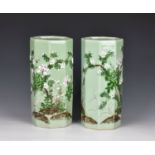 A pair of Oriental porcelain octagonal tall vases late 20th century, with flowering prunus