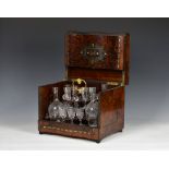 A 19th century French burr amboyna cave a liqueur the serpentine shaped tantalus with burr