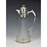 A Continental silver mounted Arts & Crafts cut glass claret jug import marks for Marples & Co,