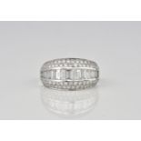 A Mappin & Webb 'Beaumont' 18ct white gold and diamond ring the central line of graduated baguette