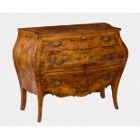 An antique Continental bombé 3 drawer commode the walnut veneers sparsely inlaid with foliate