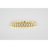 A 9ct gold beaded ring size N½.