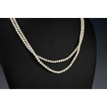 A vintage two strand seed pearl choker 1920s, with rectangular gold & seed pearl clasp, length 15¼
