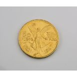A 1947 Mexico Gold 50 Pesos coin 900 fineness, weighing 41.8 grams, the Mexican 50 Pesos is a