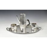 Asprey - a four piece Elizabeth II silver textured coffee service Asprey & Co Ltd, London,
