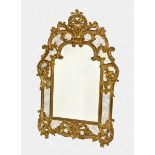 A George II style giltwood wall mirror second half 20th century, the broken arched central plate