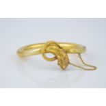 A fine quality antique Indian 22ct gold and ruby flexible snake bracelet the finely articulated