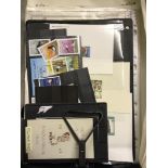 STAMPS : Box file of loose stamps and stamps on stock-cards,