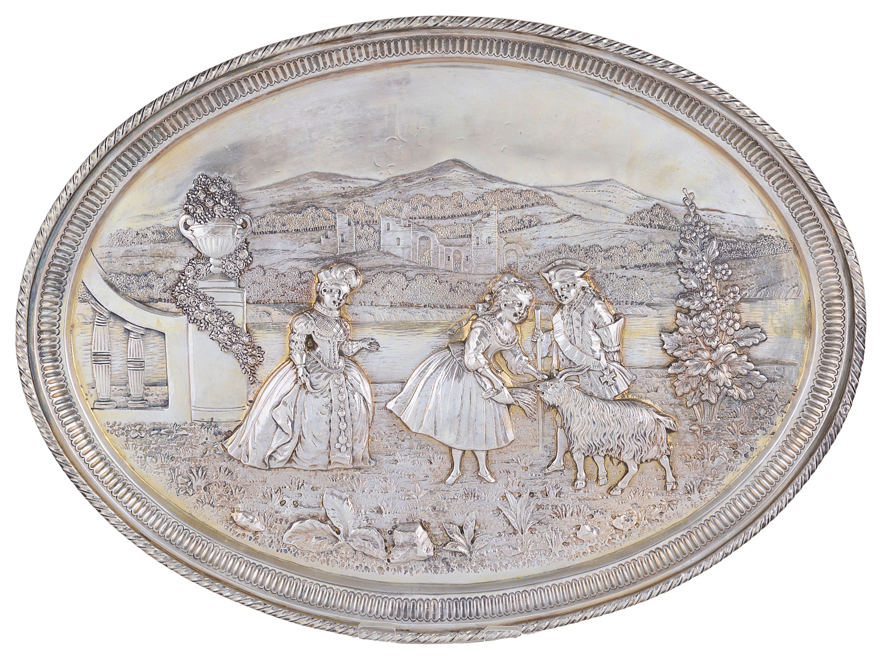 A SILVER TRAY APPARENTLY UNMARKED PROBABLY GERMAN LATE 19TH CENTURY oval chased in relief with three