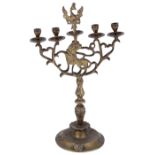 A BRASS SABBATH CANDELABRUM, GERMAN, 19TH CENTURY with Prussian eagle finial flanked by four vase