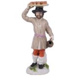 A MEISSEN 'CRIS DE ST PETERSBOURG' SERIES FIGURE OF A DRINKS SELLER, MID 18TH CENTURY probably