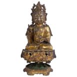 A CHINESE GILT-BRONZE FIGURE OF GUANYIN ON A PEDESTAL LOTUS STAND, MING DYNASTY, 16TH / 17TH CENTURY