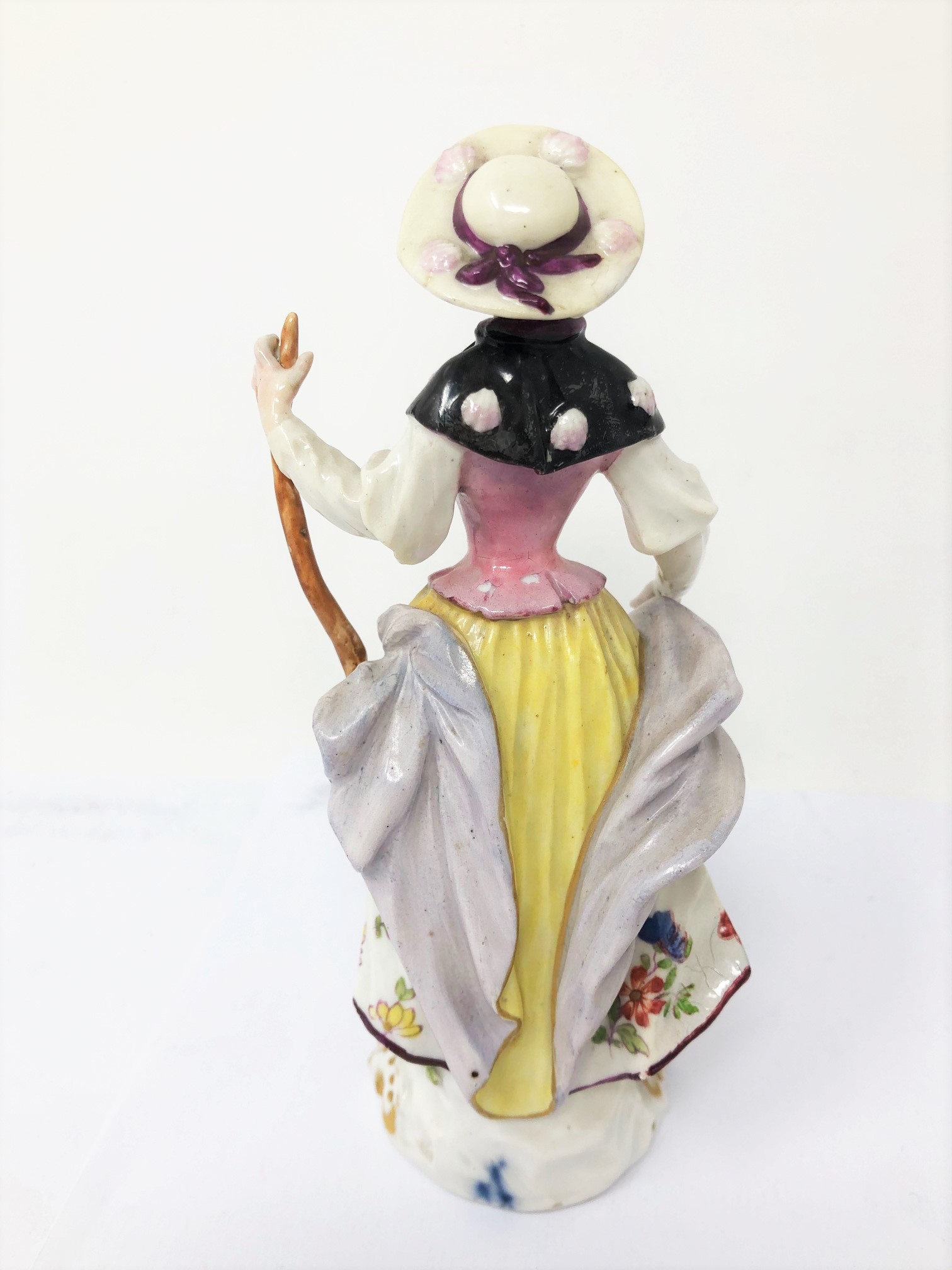 A MEISSEN FIGURE OF A PILGRIM, CIRCA 1750 modelled standing holding a staff in her left hand, - Image 3 of 5