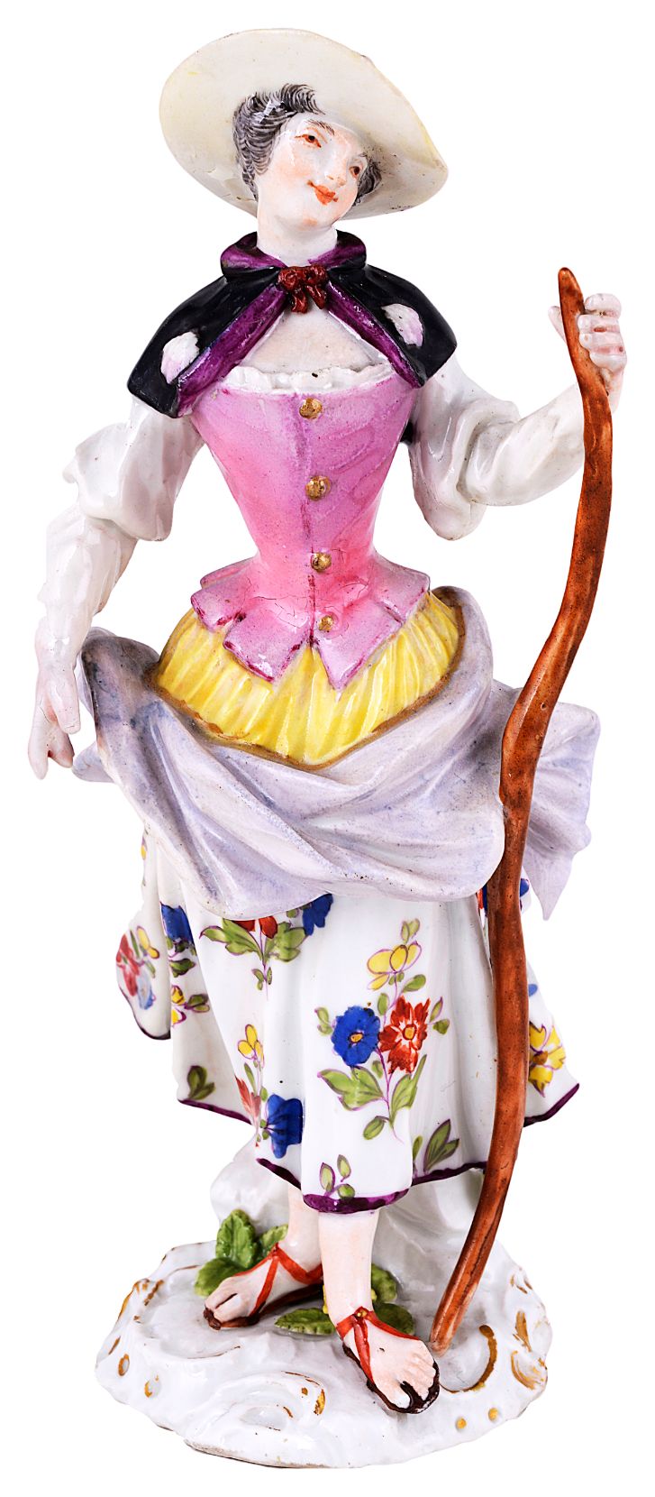 A MEISSEN FIGURE OF A PILGRIM, CIRCA 1750 modelled standing holding a staff in her left hand,