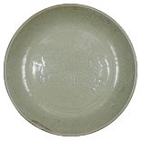 A CHINESE 'LONGQUAN' CELADON LARGE DISH, MING DYNASTY, 15TH CENTURY centrally incised with flowering