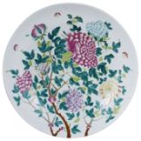 A CHINESE FAMILLE ROSE LARGE DISH, LATE 19TH / EARLY 20TH CENTURY enamelled with leafy branches of