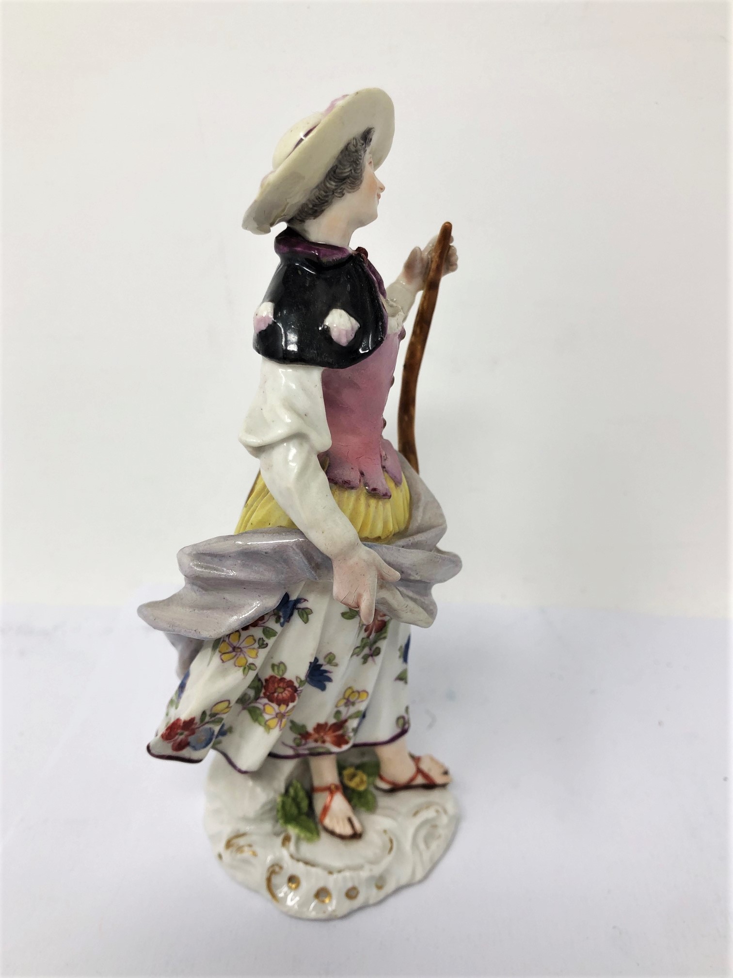 A MEISSEN FIGURE OF A PILGRIM, CIRCA 1750 modelled standing holding a staff in her left hand, - Image 2 of 5