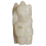 A CHINESE GREYISH-WHITE JADE CARVING OF A BOY carved standing holding a basket and wearing an animal