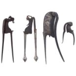 FOUR PAIRS OF IRON BETEL CUTTERS, INDONESIAN ARCHIPELAGO, 19TH CENTURY each of zoomorphic form,