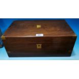 A Victorian brass bound walnut lap desk with fitted interior