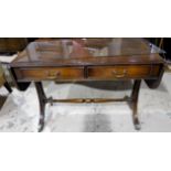 A crossbanded mahogany reproduction sofa table with 2 frieze drawers