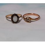 An early 20th century gold dress ring set 3 small diamonds; another set opal and garnets