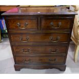 A mahogany reproduction dwarf chest of 3 long and 2 short drawers