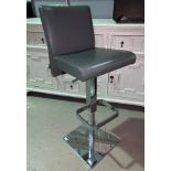 An Italian designer chrome rise and fall bar chair by Peressini Casa upholstered in grey leather