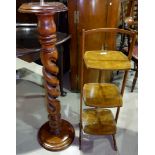A 3 height folding cake stand; a reproduction torchère with turned column
