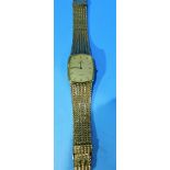 A gold plated Omega De Ville with quartz movement, on woven metal strap