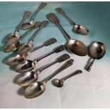 A set of 8 fiddle pattern teaspoons, monogrammed, Newcastle 1859; 4 other silver spoons