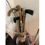 A silver mounted swagger sick; other walking sticks