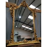 A large wall mirror in ornate gilt frame, height 60"