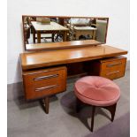 A 1960's G-Plan style teak dressing table and stool