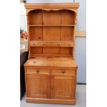 A Victorian style pine Welsh dresser with raised back, 2 cupboards and 2 drawers