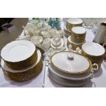 A Sandringham bone china part dinner and tea service with gilt rim and ribbed decoration