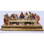 A large Capodimonte figure group depicting the Last Supper, Christ with the disciples, after